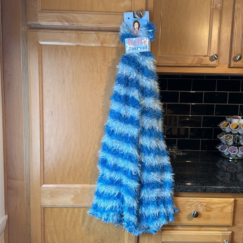 Belle Scarf, one size, shades of blue and light blue. Brand new.
